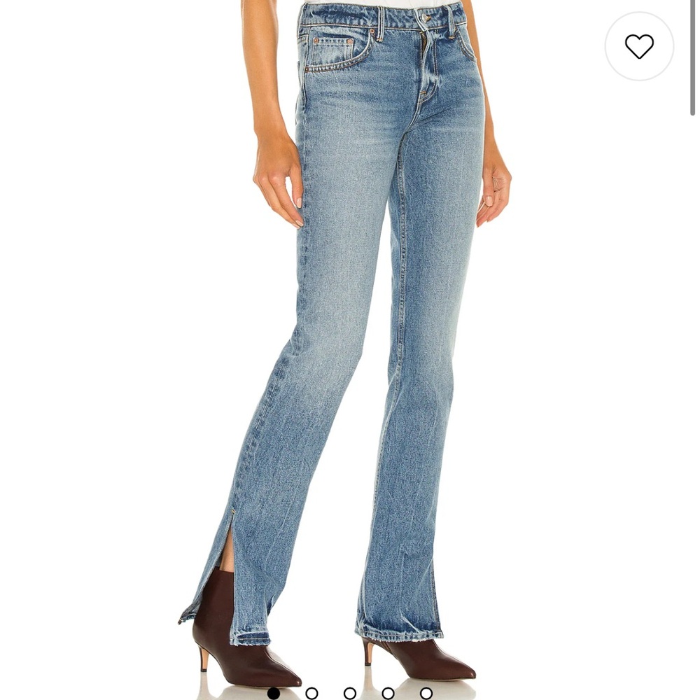 Revolve GRLFRND Hailey Low Rise Slim Boot with Slit Hem Seams | Light Blue Jeans